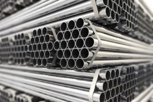 Stacked shiny metal round tubes.