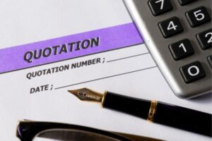 Quotation form with pen and calculator