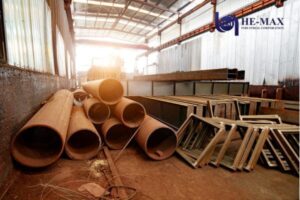 Steel pipes and beams stored in warehouse