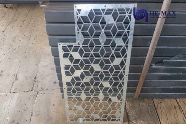 Hexagonal aluminum plate with evenly spaced holes