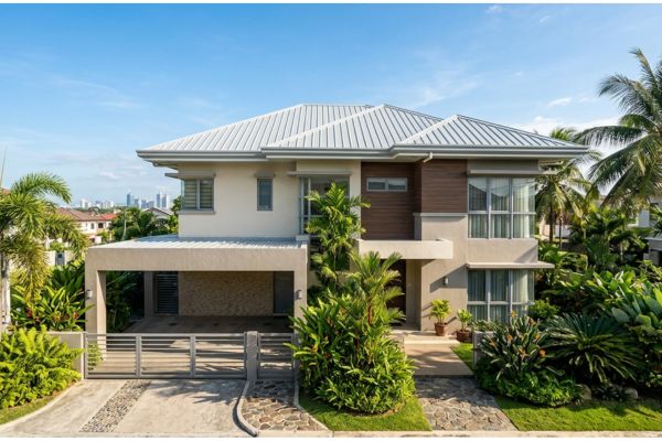 A contemporary house with a large driveway
