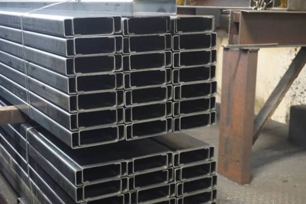Rectangular hollow steel sections (RHS) stacked for structural steel fabrication and construction applications.