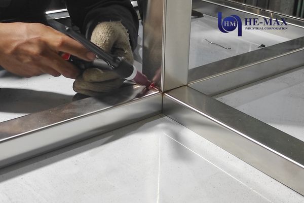 Precision welding of a metal frame joint