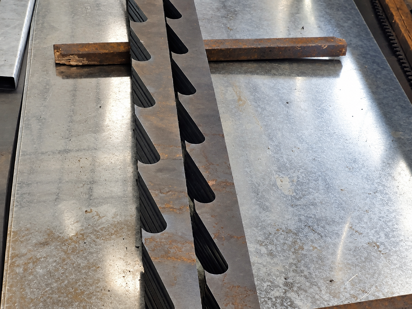 Precision-cut steel components with custom slots