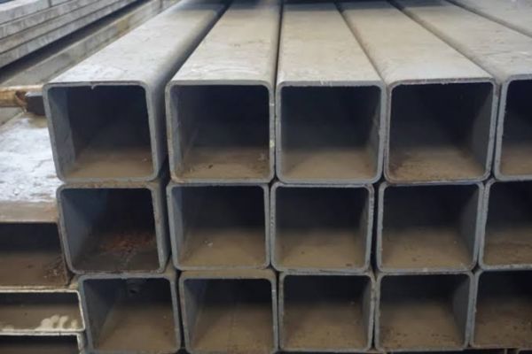 tubular steel quality A close-up of a steel square tube, showcasing its smooth surface and structural design for construction use.